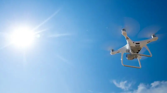 the drone flying in the hot day