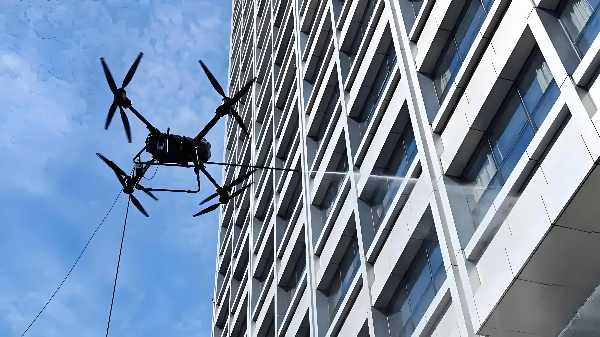 Cleaning Drone with Ground Booster