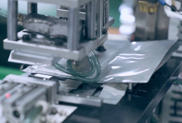 Automatic Taping After Top Sealing